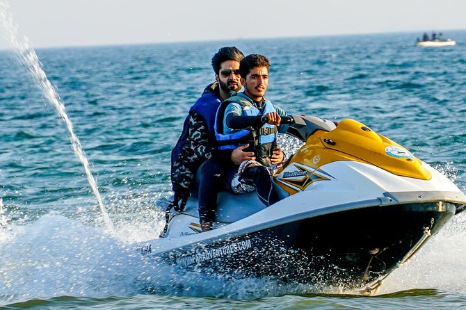 men riding on a jet ski - Jet Ski Rental Scarborough