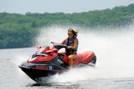 woman on a red jet ski - Best Places to Rent Jet Ski in Toronto like Toronto Yacht Rentals - Jet Ski - Boat - & Charters